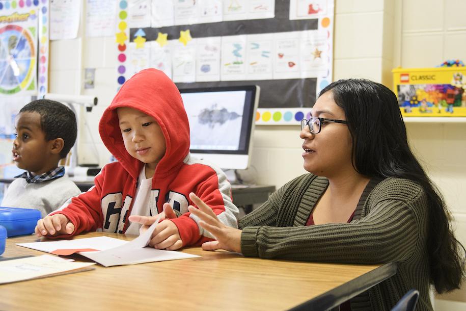 Student teacher works with early childhood education students