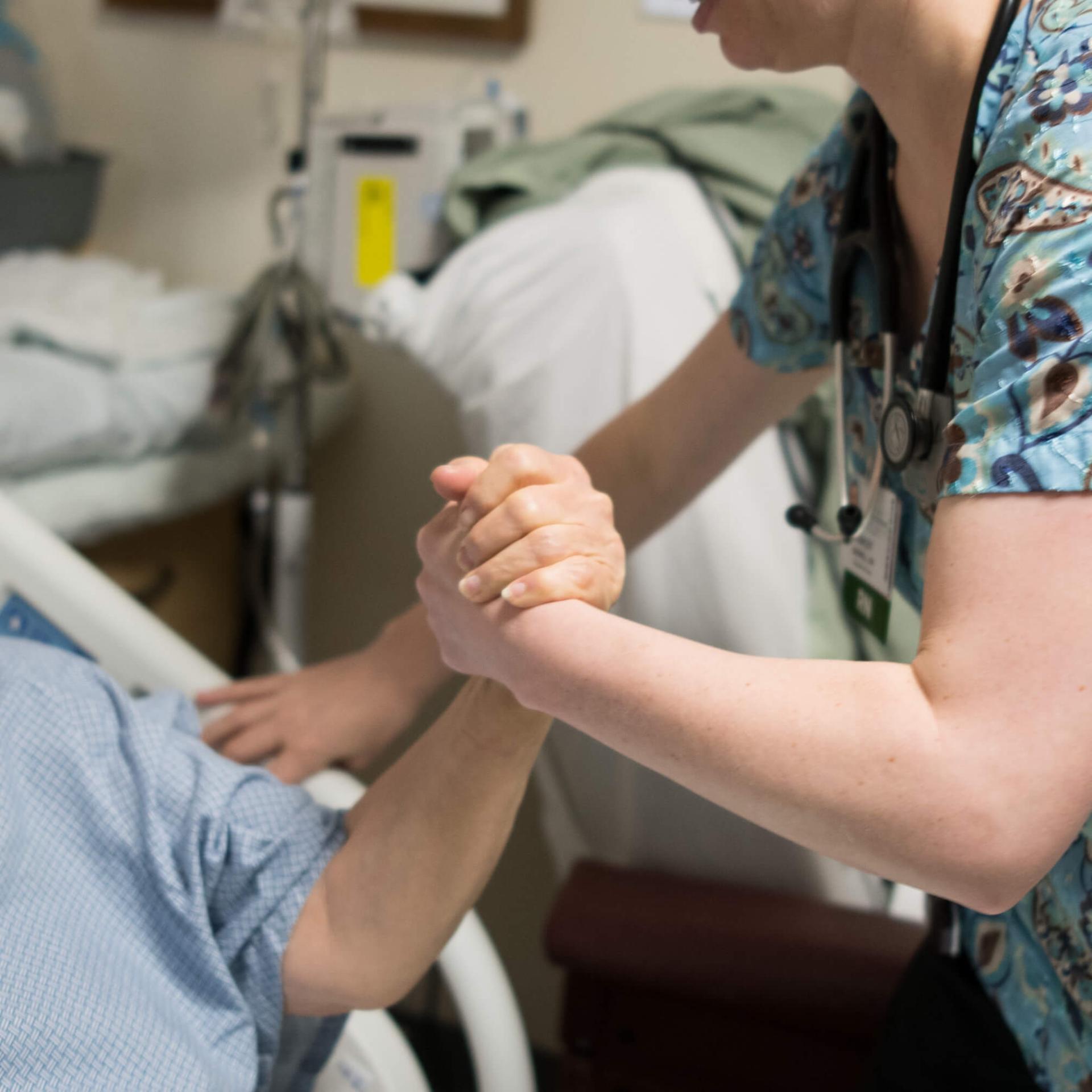 Nurse with patient in hospital